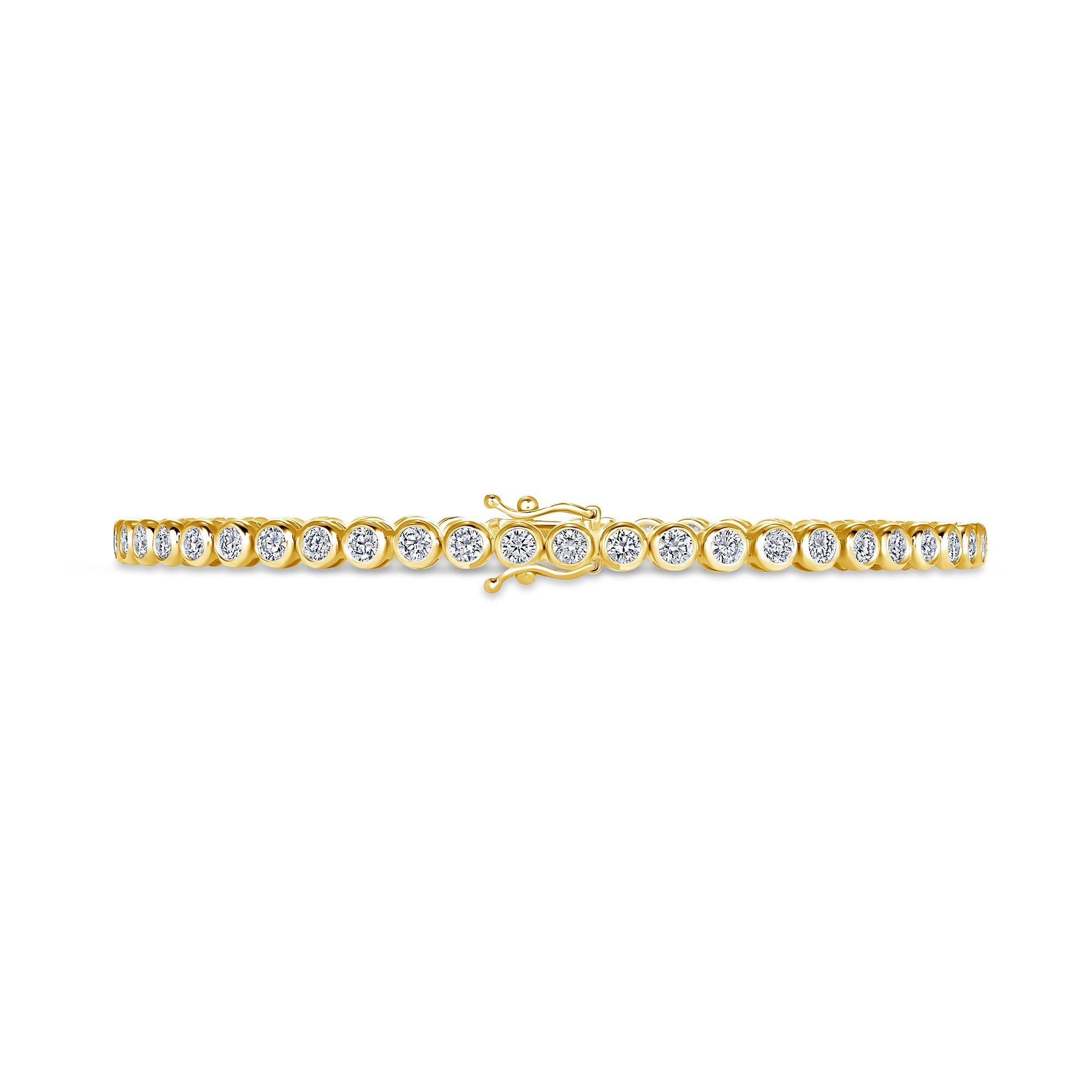 Bezel set diamond tennis bracelet worn on the wrist in 14K yellow gold #Metal_Yellow Gold