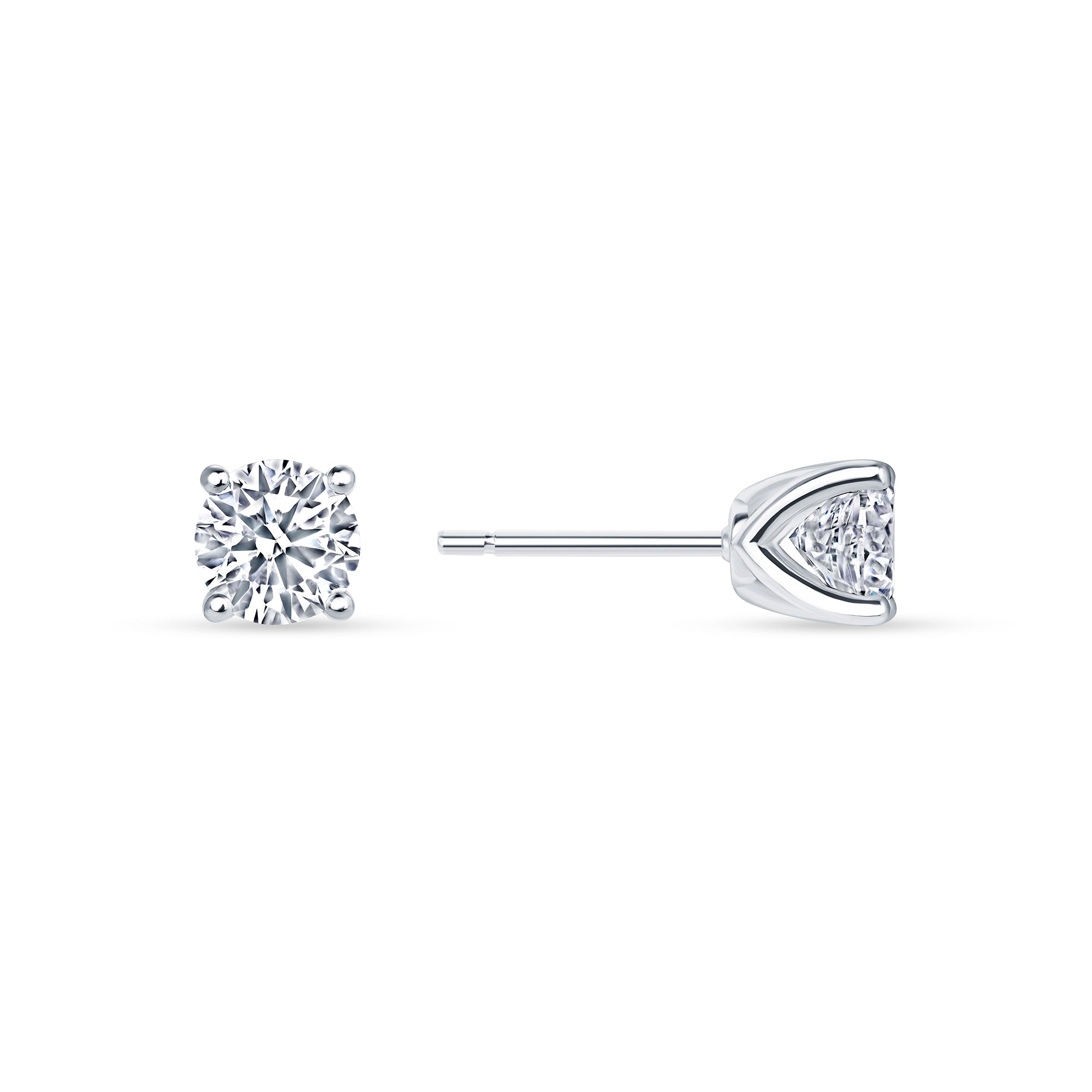 Round lab grown diamond stud earrings worn on the ear, 1.07 carat total weight