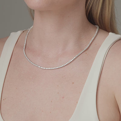 10.85 carat round diamond tennis necklace shown in motion on the neck