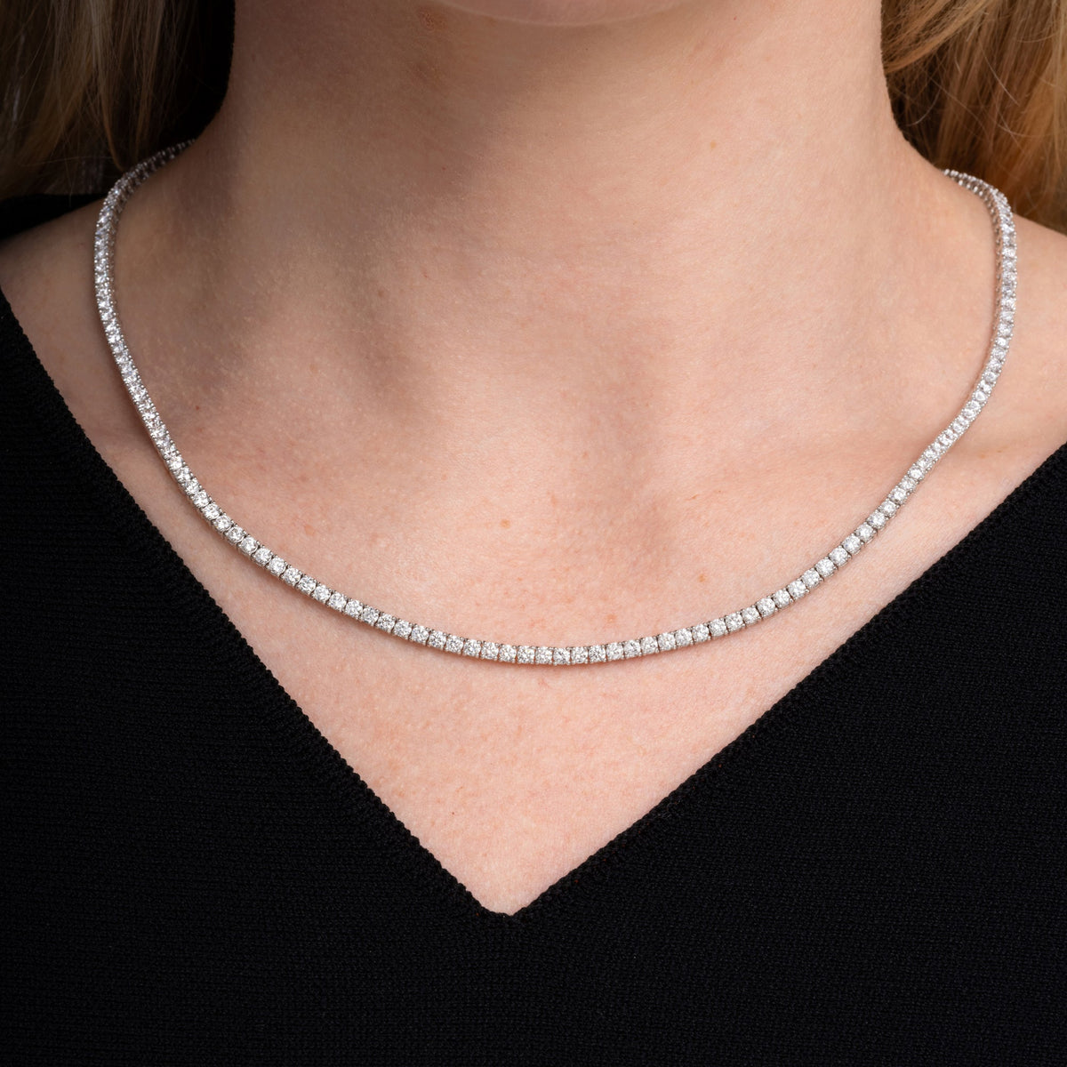 10.85 carat round diamond tennis necklace worn at the collarbone