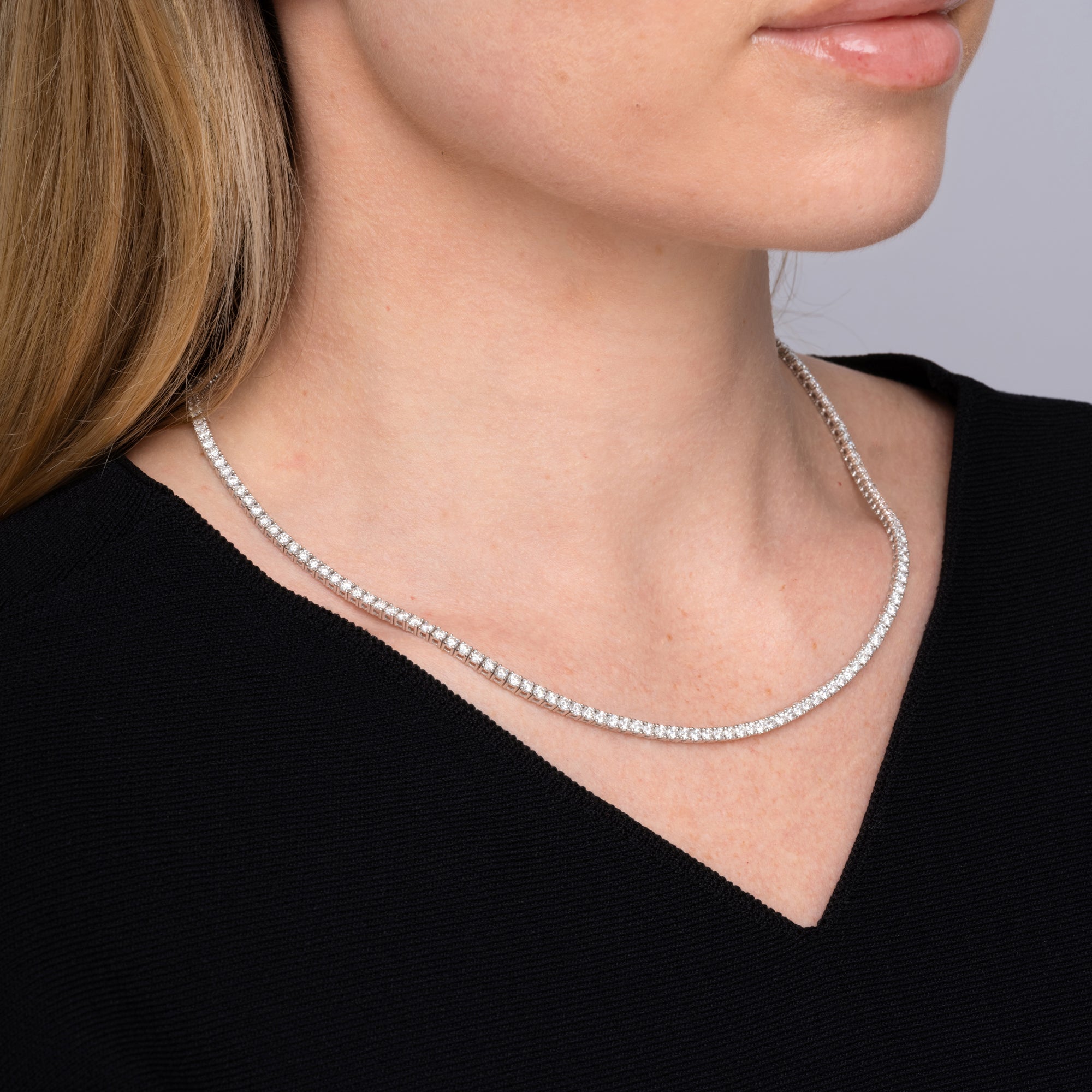 10.85 carat round diamond tennis necklace worn at the collarbone