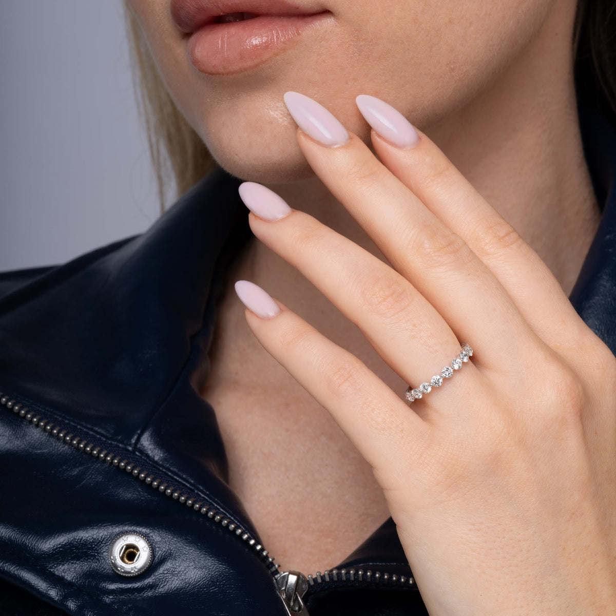 1 carat half eternity band shown on the finger